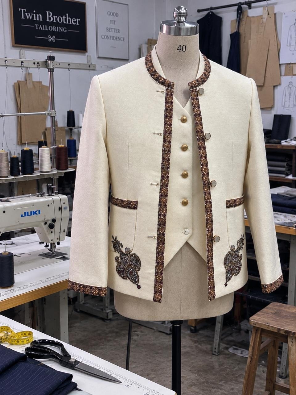Twin Brother Tailoring workshop in Shillong with Juki machine, measuring shears and tailor dummy